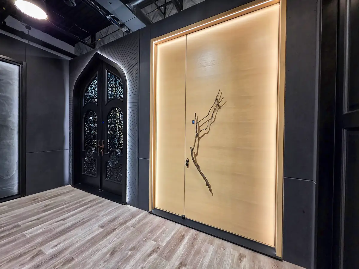 Custom oak door with sculptural branch handle at Arista Doors